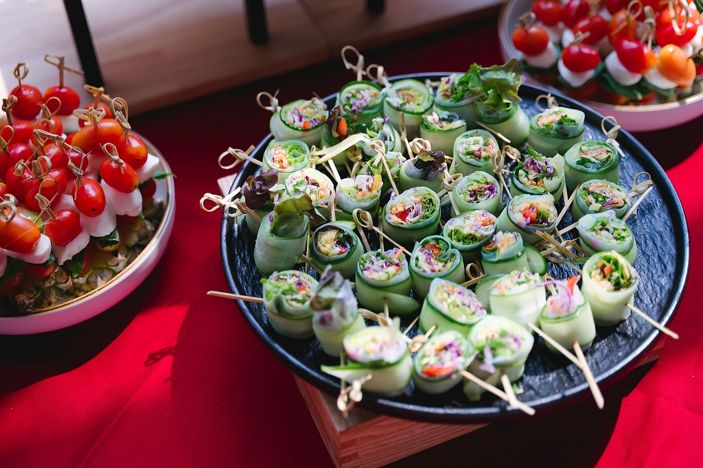yacht party catering in Phuket with seafood tower, sushi, and chilled prosecco