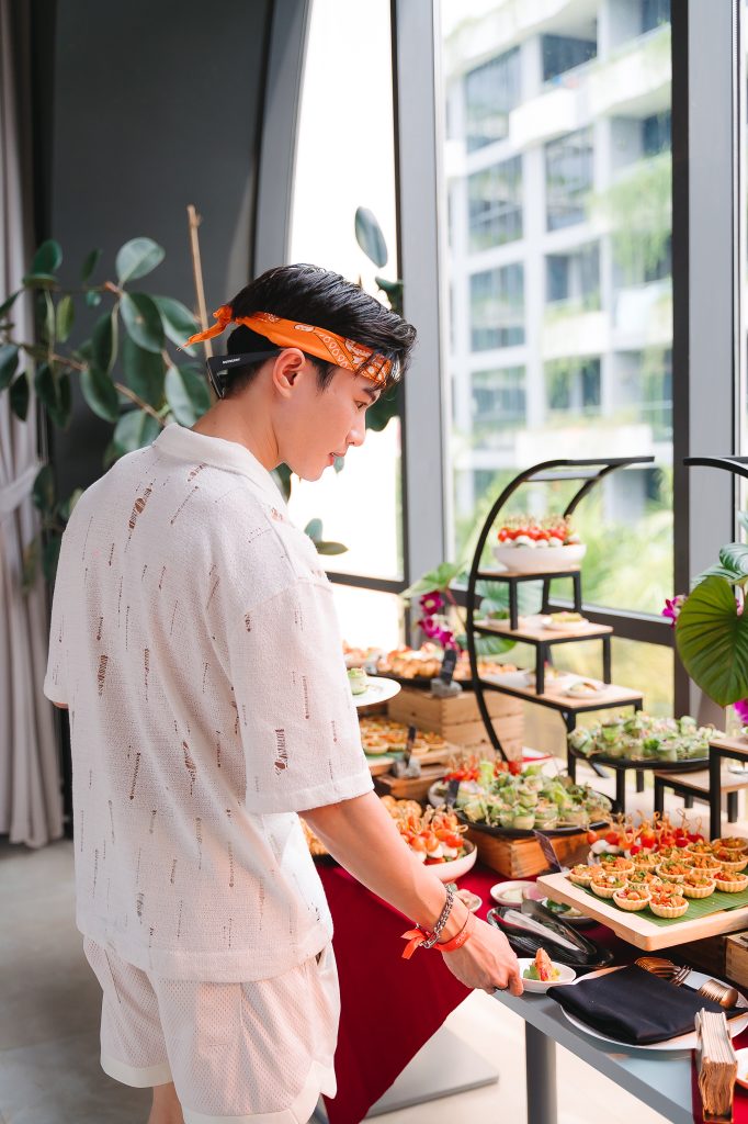 Gourmet canapé reception in Phuket villa at sunset with tray-passed hors d’oeuvres