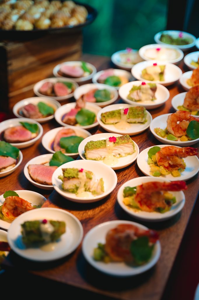 Outdoor BBQ catering in Phuket with tomahawk steaks and seafood grill stations